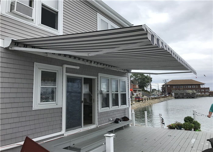 Motorized semi-cassette retractable awning with wind sensor for Villa