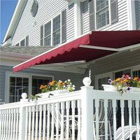 Black patio retractable awning with motor and manual control
