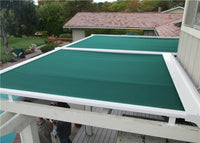 UV resistant motorized conservatory awning with overhang